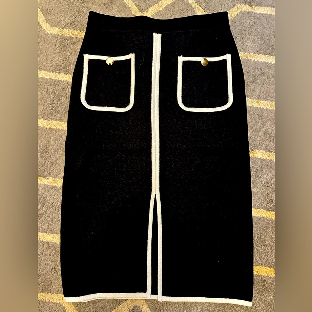 Black skirt with pockets and white trim
